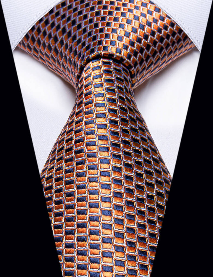 black suit burnt orange  and blue necktie 