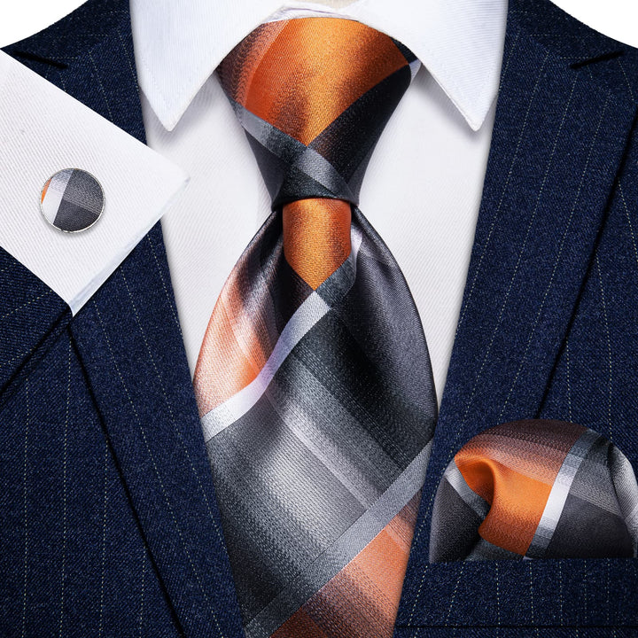 blue suit orange tie