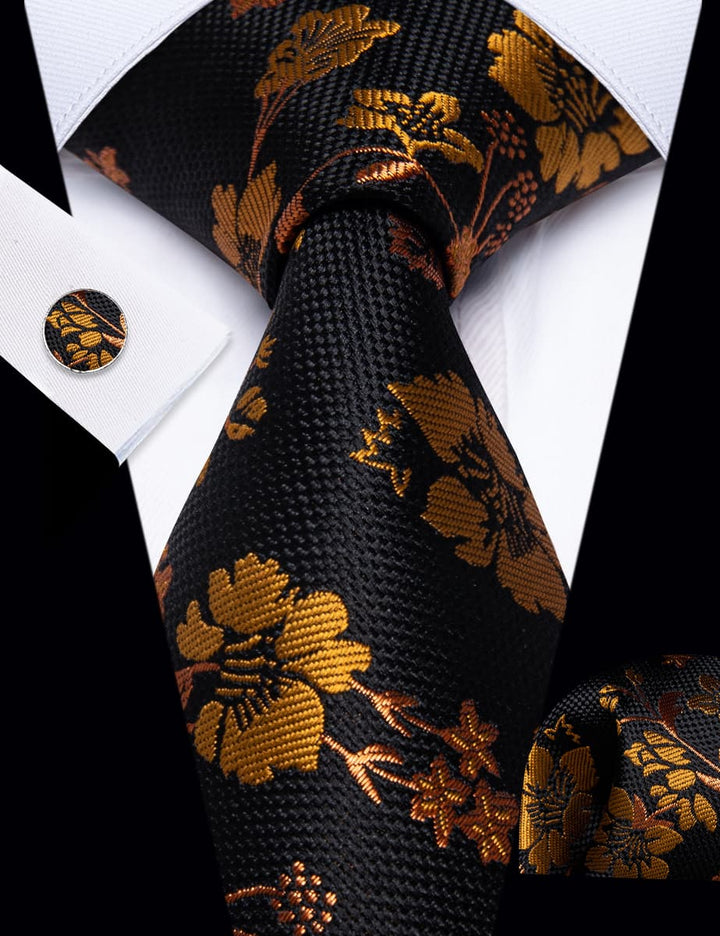 black suit blazer gold necktie 