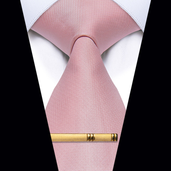 Pink tie with gold clip